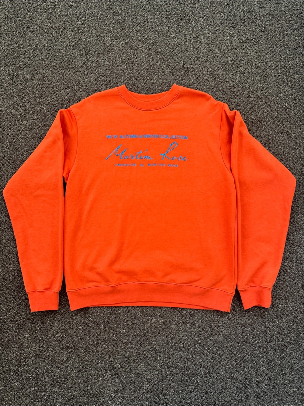 Martine Rose Bright Orange Crewneck Sweatshirt with Blue Logo